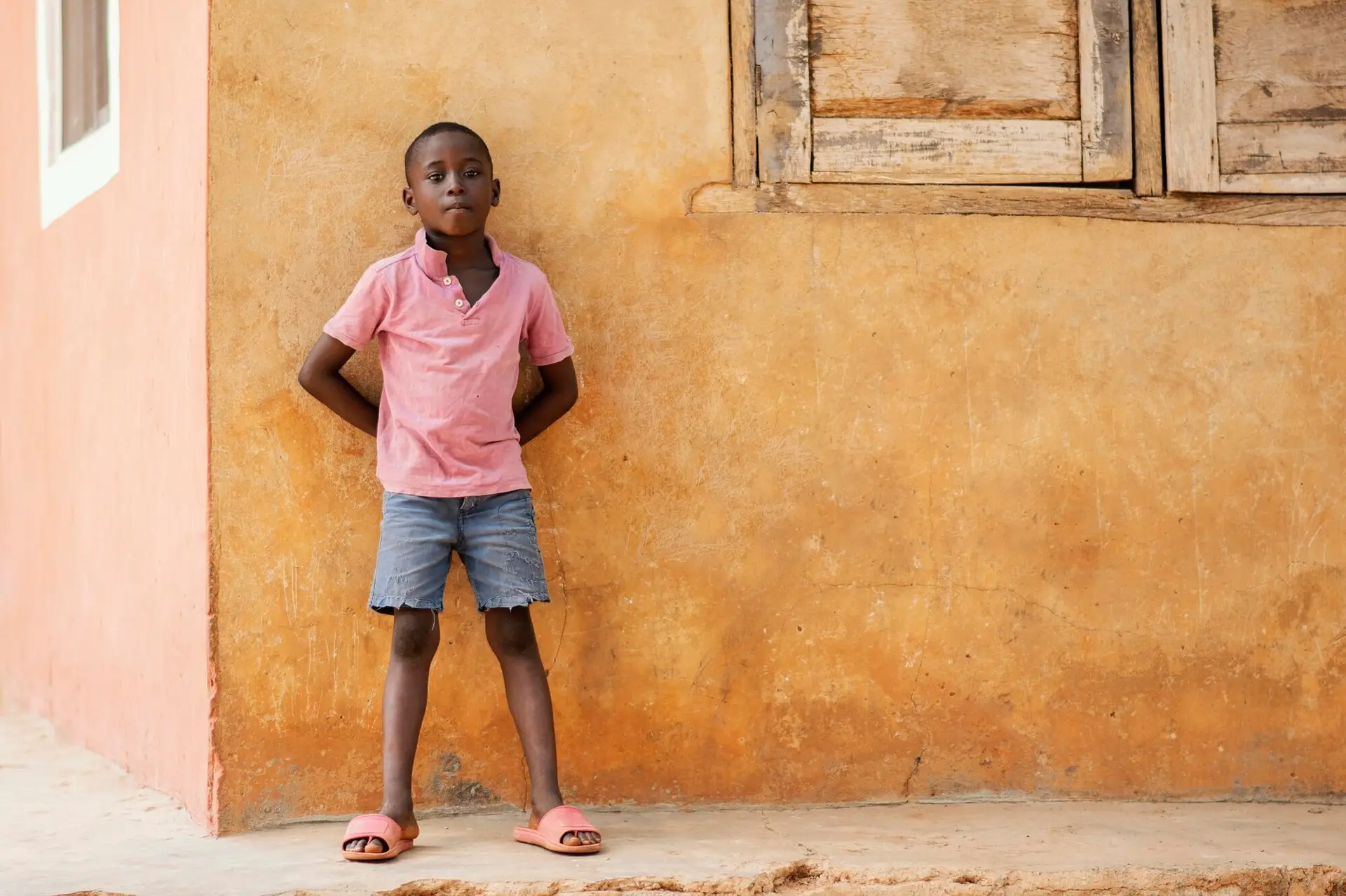 full-shot-african-boy-outdoors_23-2148860398